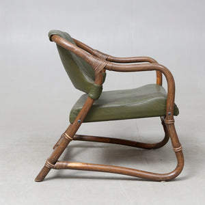 Set van drie Rotan fauteuils met groen lederen bekleding jaren 60. Zweeds ontwerp (#415)